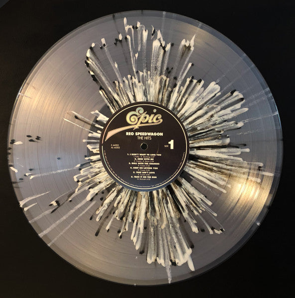 REO Speedwagon – The Hits - LP Transparente